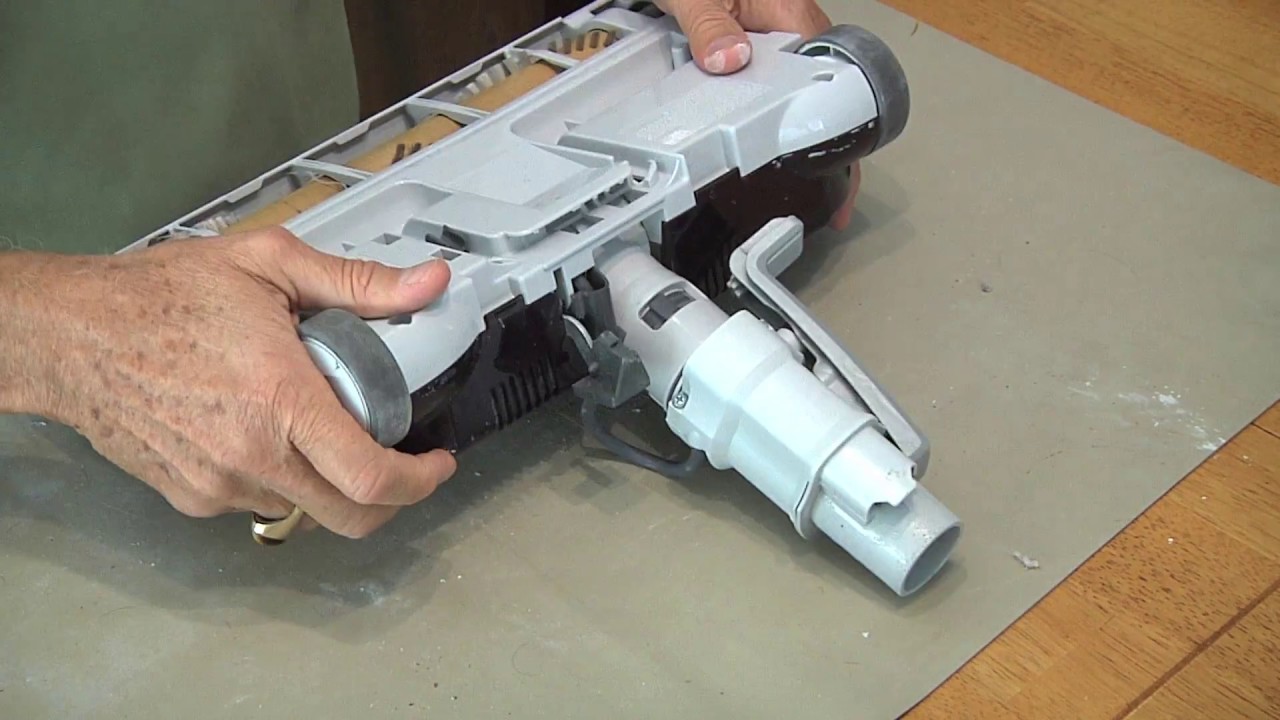 Ремонт колес/осей пылесоса Kenmore Progressive с контейнером для сбора пыли.