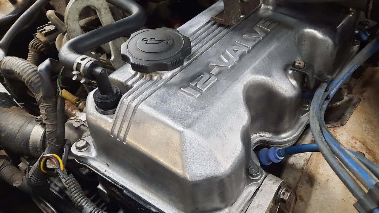 Installing Valve Cover Gasket, Cap & Rotor. Mazda B2600i