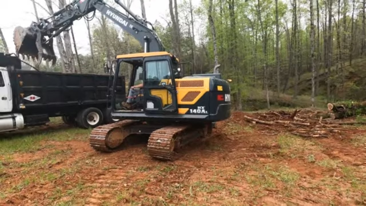 Moving and Hauling Dirt to build up land in Clemson