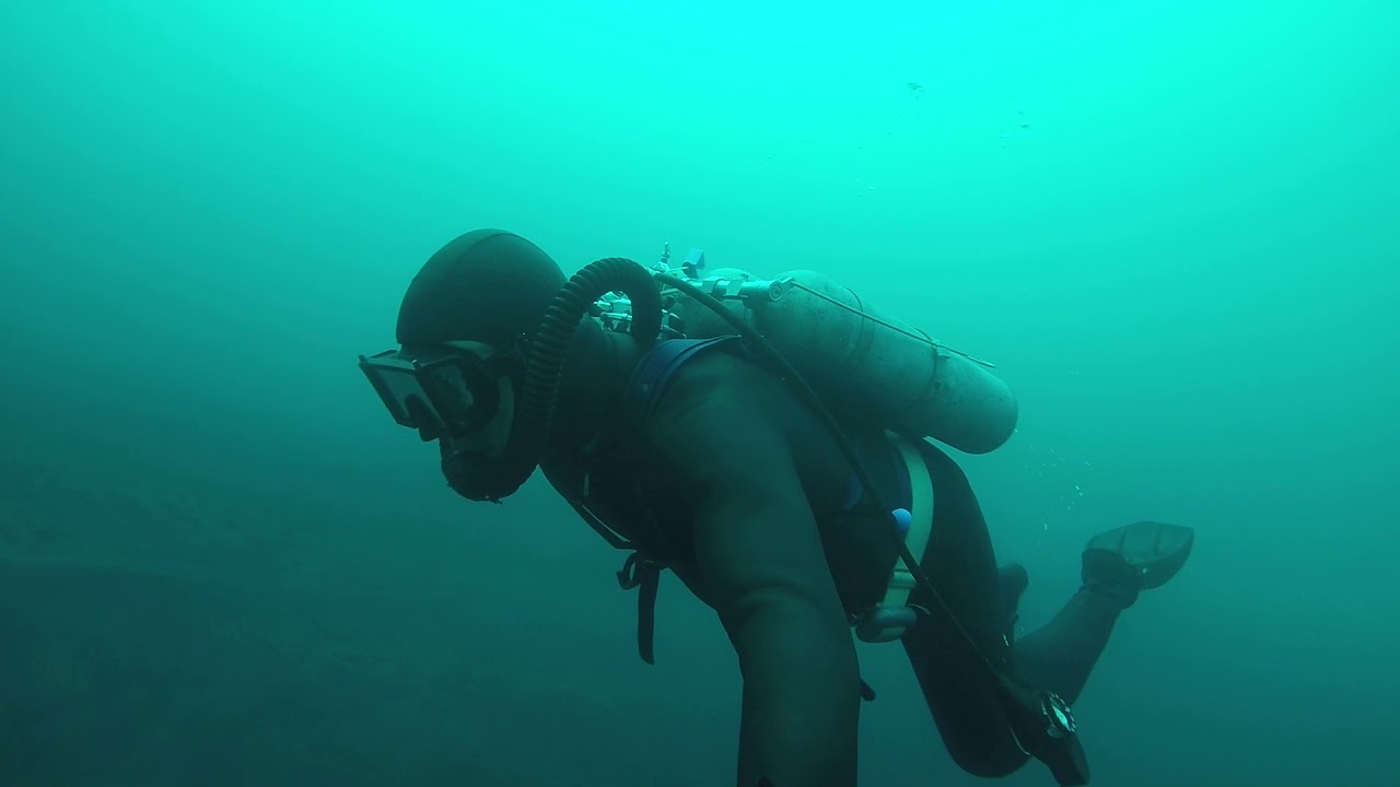 Visiting the mirror while doing vintage scuba diving at Fortune Pond