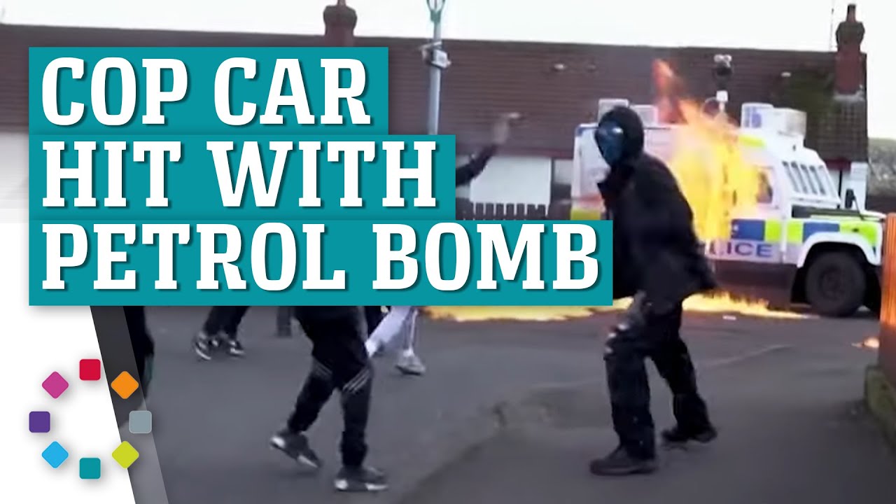 Flames erupt as Petrol bombs thrown at police car