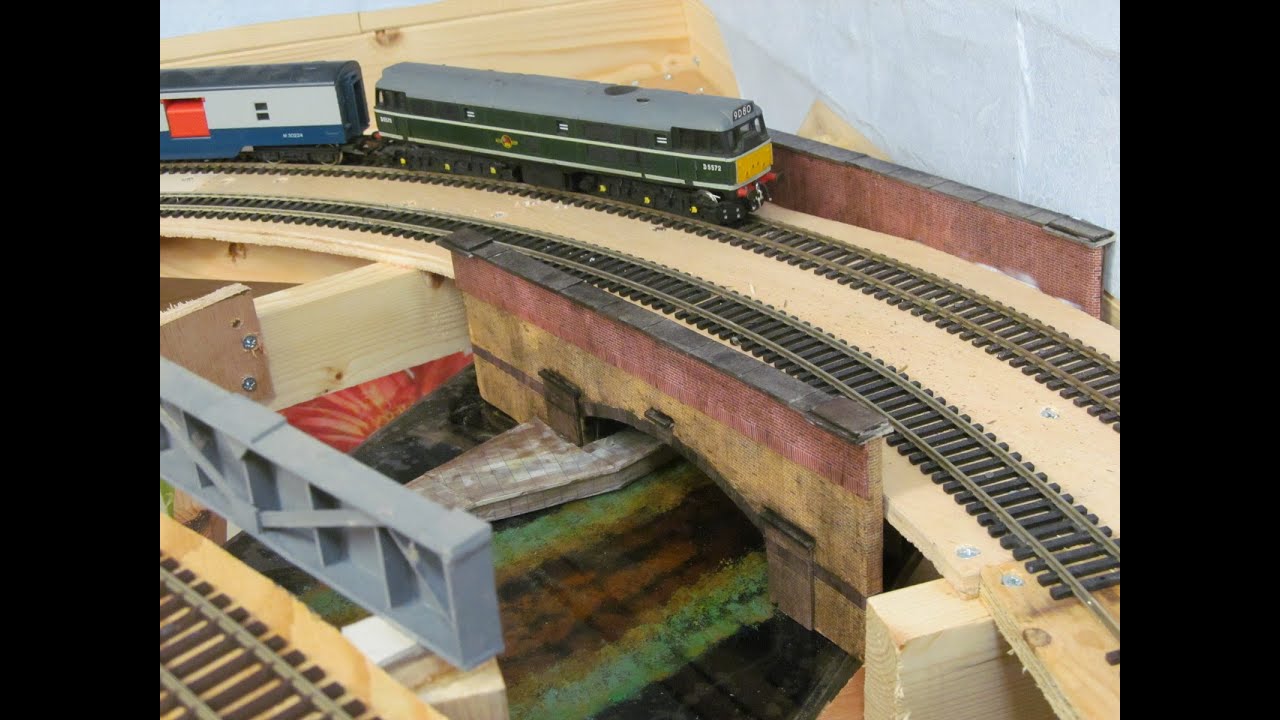Buckland Junction Loft Model Railway 18. Brick River Bridge Scratch Building in 2mm grey cardboard.