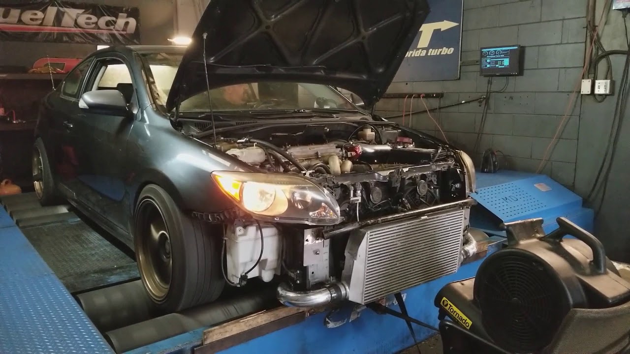 Scion Tc custom manifold and turbo kit spinning on the dyno at CFT at 10psi!