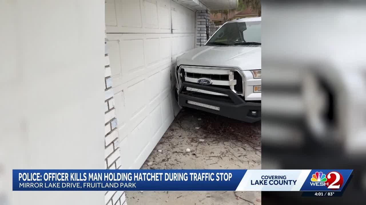 Man with hatchet shot, killed by officer in Lake County