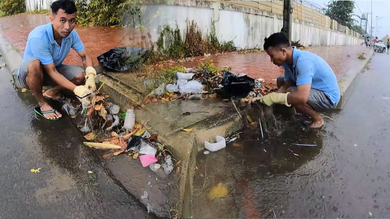 Prevent and Saving Plastic Trash and Debris Clogged Culvert Drain a long street