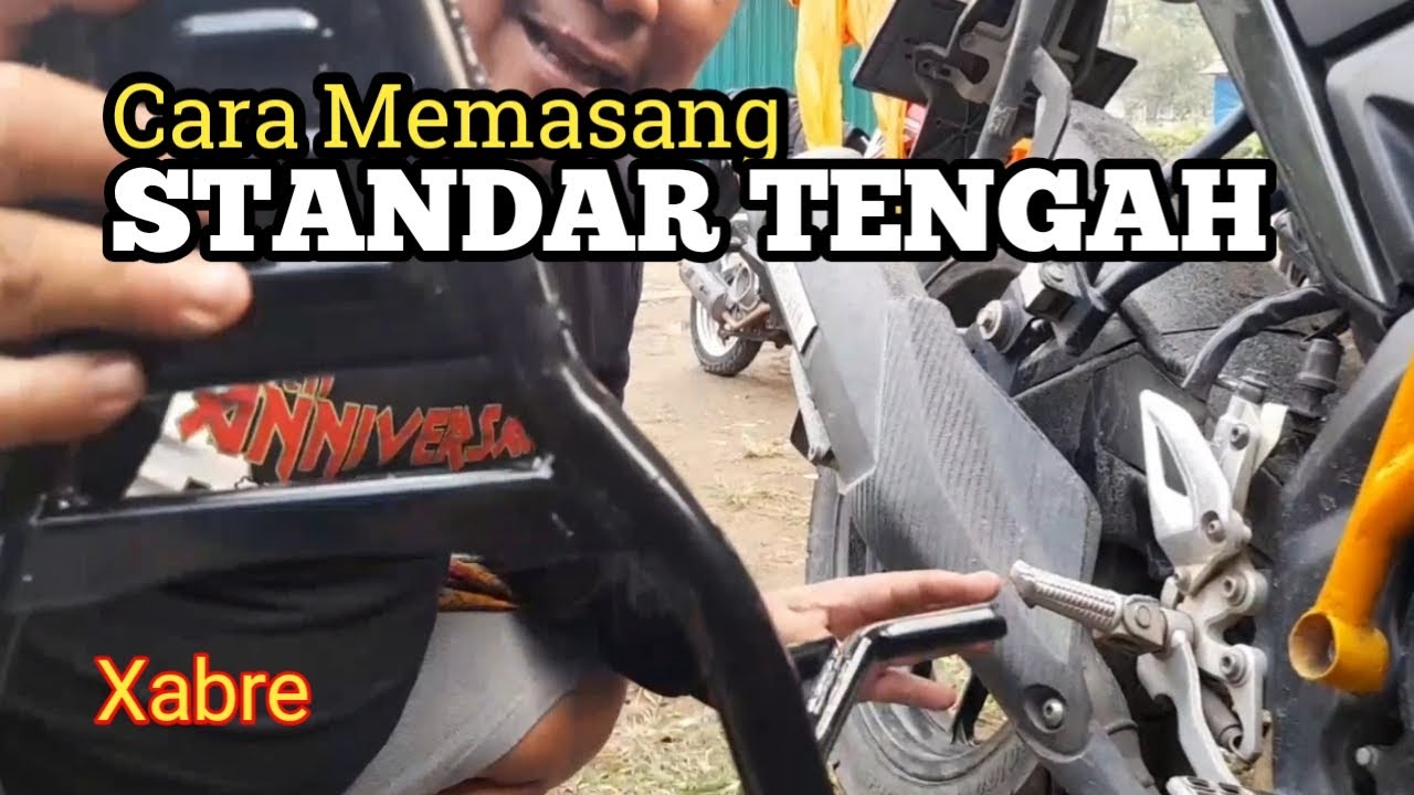 Cara memasang standar tengah di motor Xabre