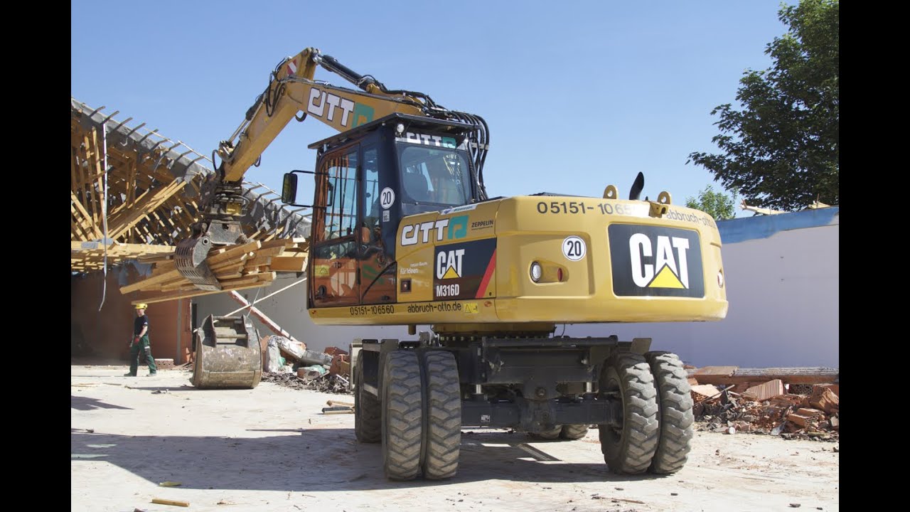Cat M 316 D + mit Oil Quick 65 im Abbrucheinsatz