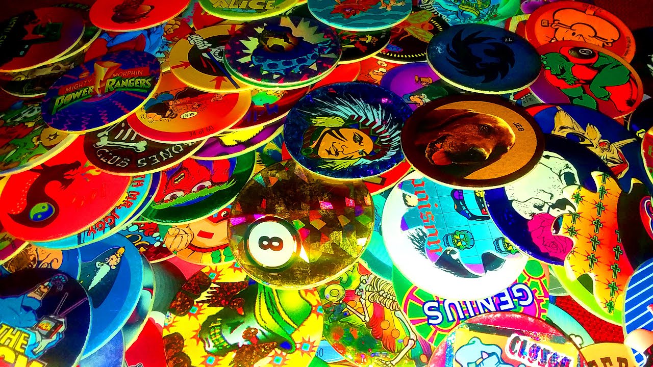 SORTING THROUGH a pile of Nostalgic 90's POGs