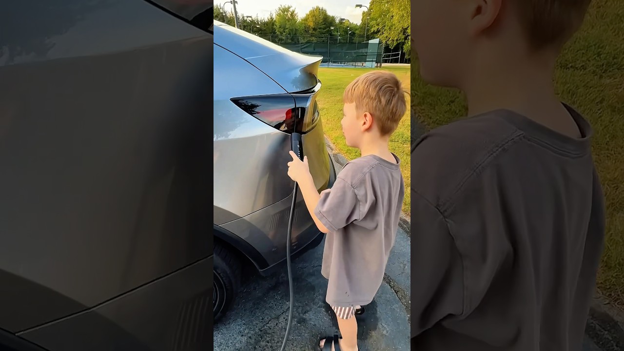 Charging a Tesla is as easy as charging a phone for a kid. 😳 #tesla #automobile