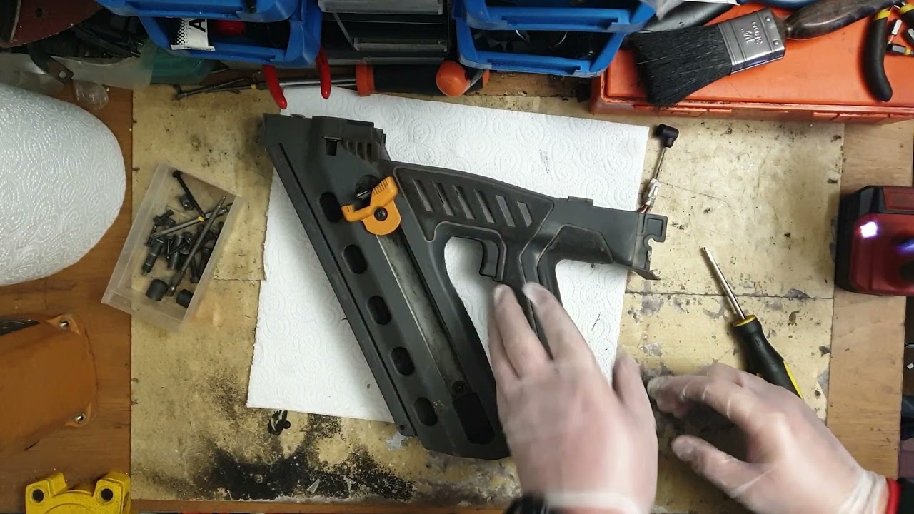BOSTITCH NAIL GUN REPAIR AND CLEN INSIDE AND OUTSIDE