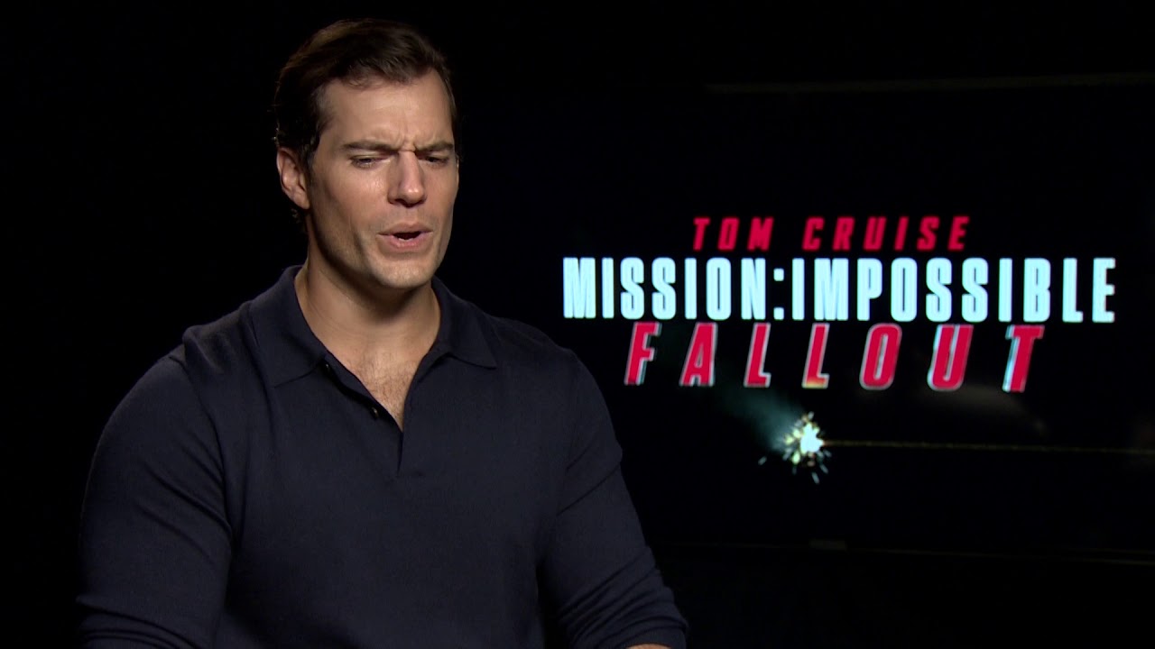 Henry Cavill is still getting used to calling Tom Cruise “Tom”…