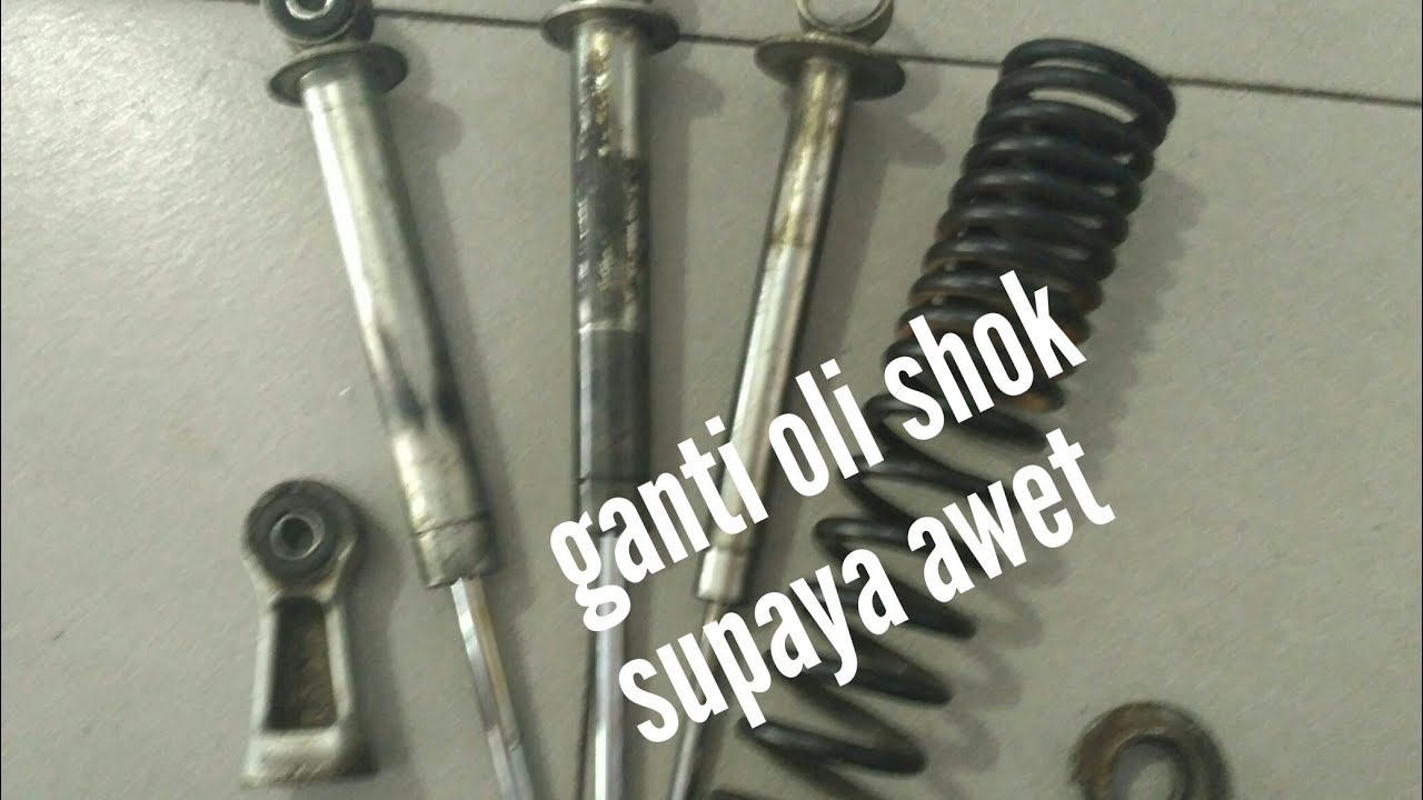 cara ganti oli shock belakang motor