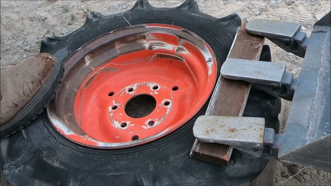 Changing Kubota FrontTractor Tires By Hand