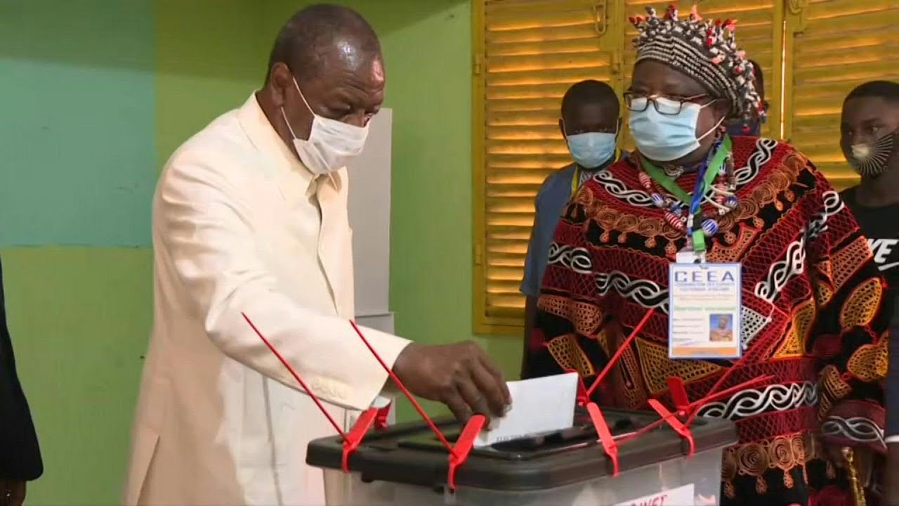 Guinean President Alpha Conde casts vote as he bids for third term | AFP