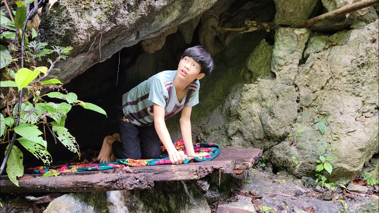 The orphan boy- discovered traces of wild chickens, made his own traps, lived wild in the forest