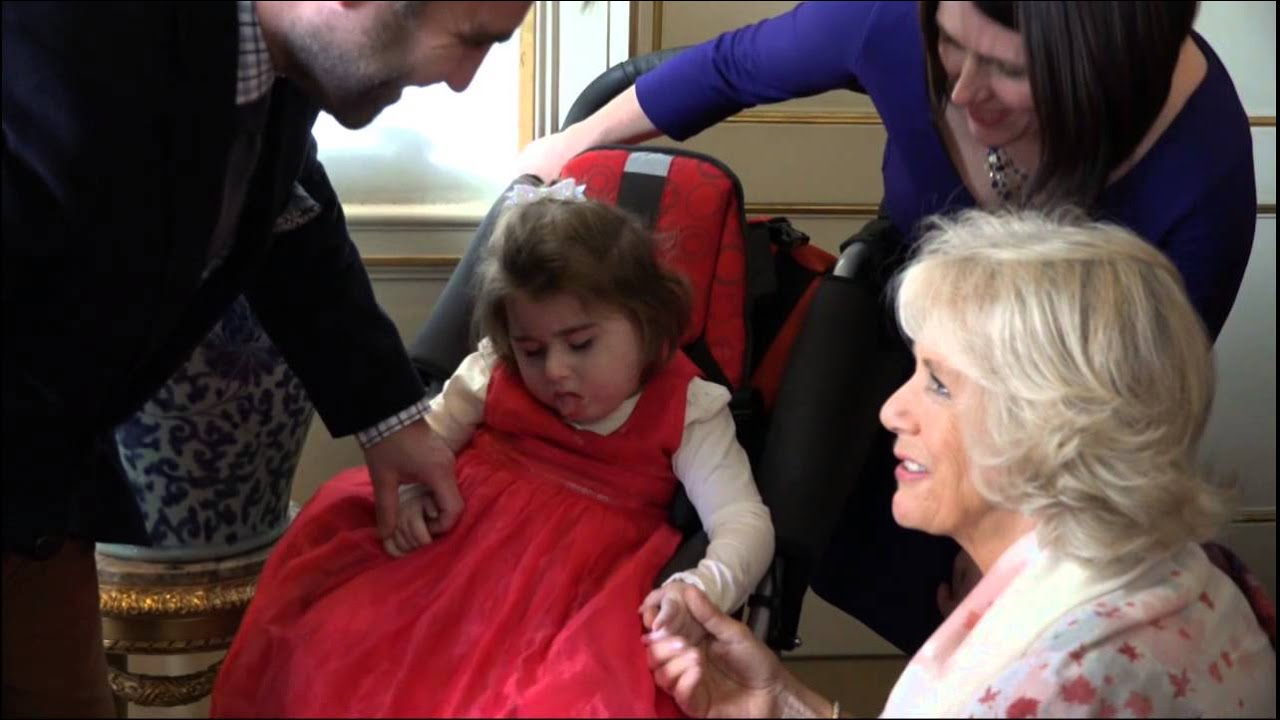 The Duchess of Cornwall invites children from Helen & Douglas House to decorate the Christmas tree