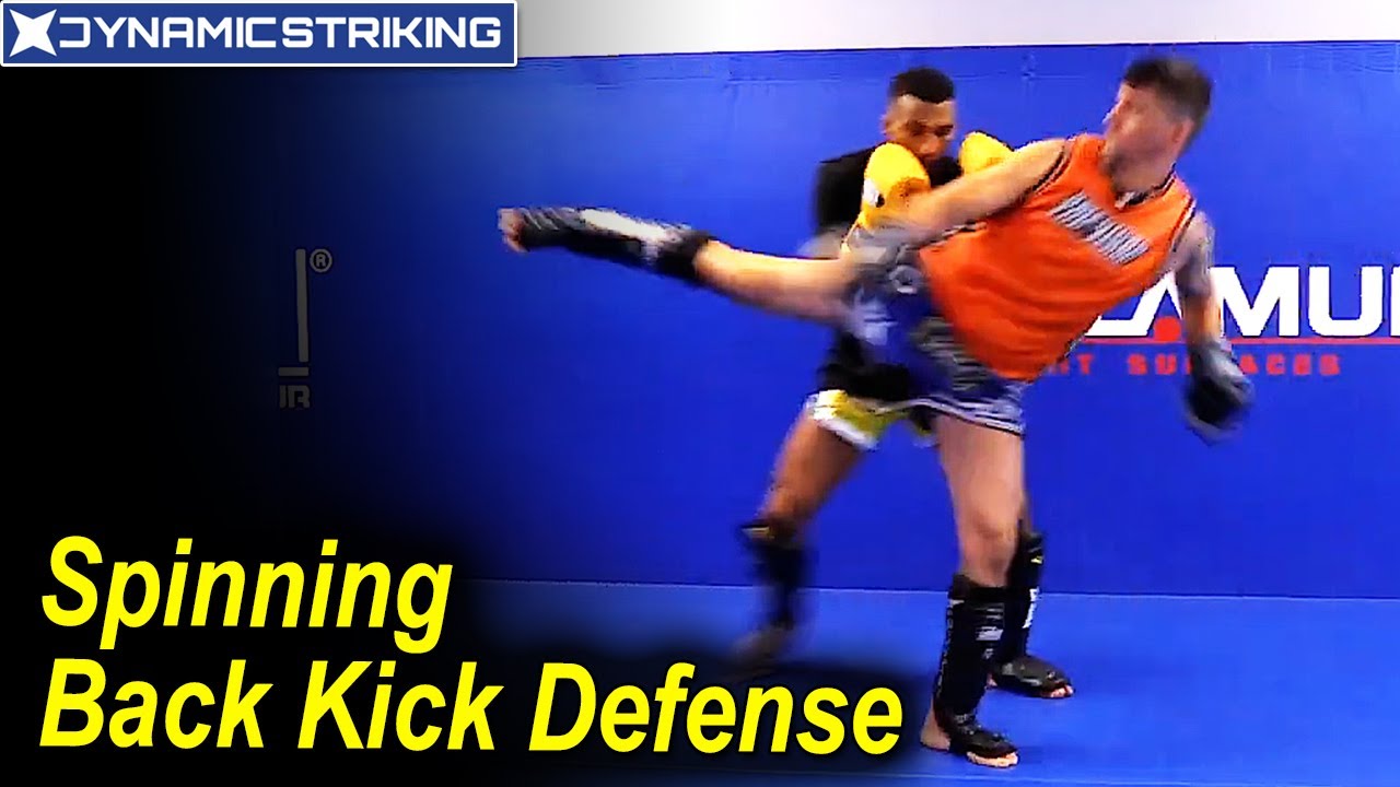 Spinning Back Kick Defense by Edson Barboza