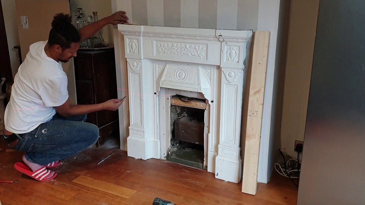 Installing a fire place surround and a Mantle