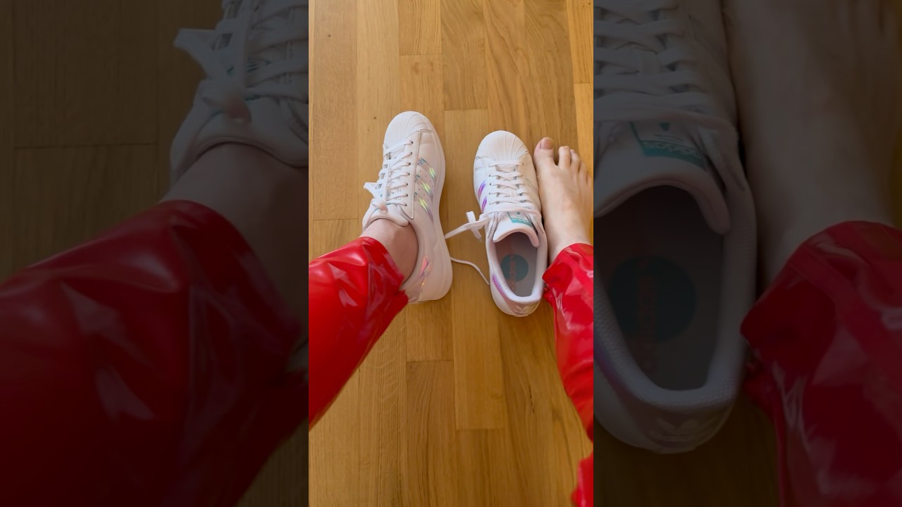 Adidas Superstar iridescent with sockless feet and Latex Pants red