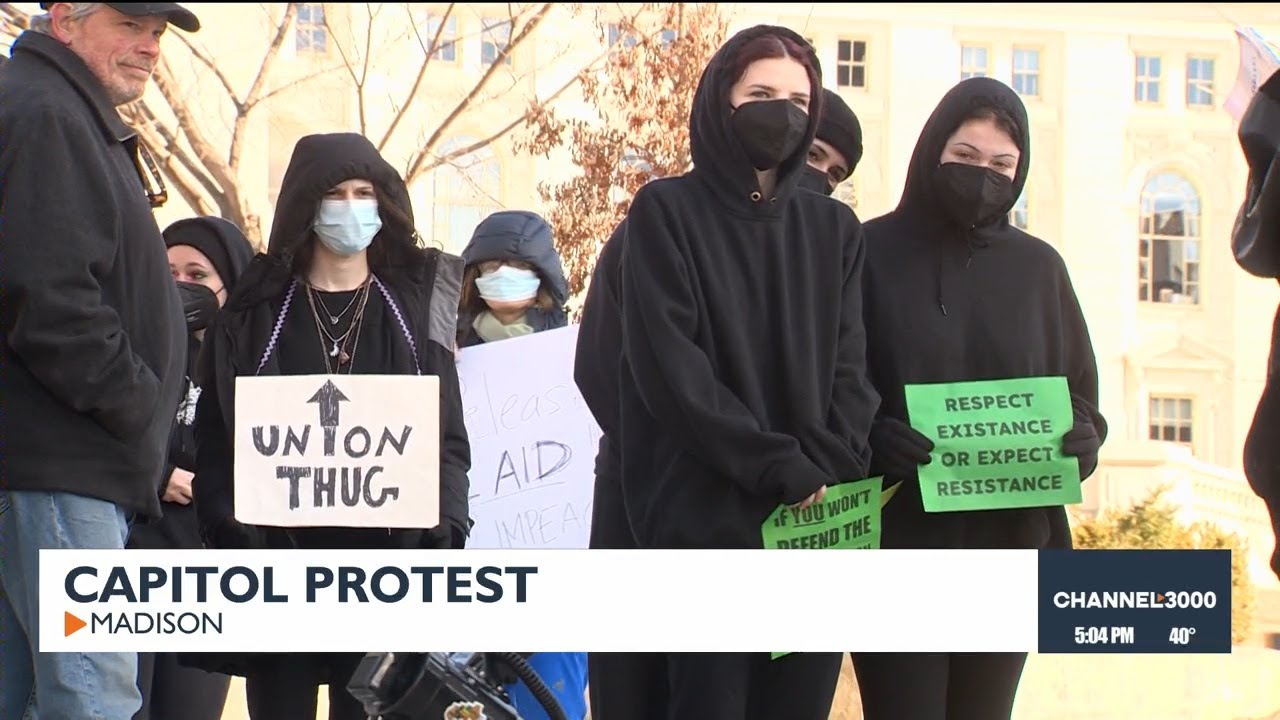 Protestors protest Trump policies at the Capitol