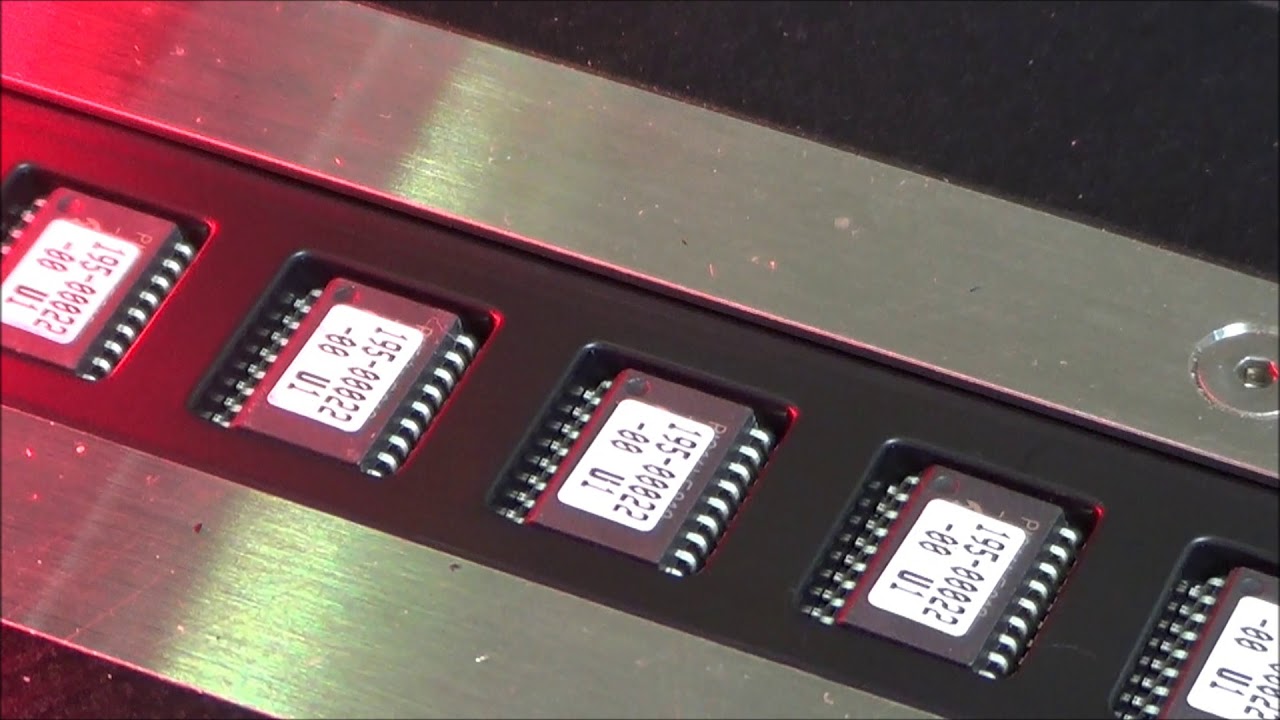 V-Tek TM-50 Tape and reel system inspecting soic18.through the cover tape.