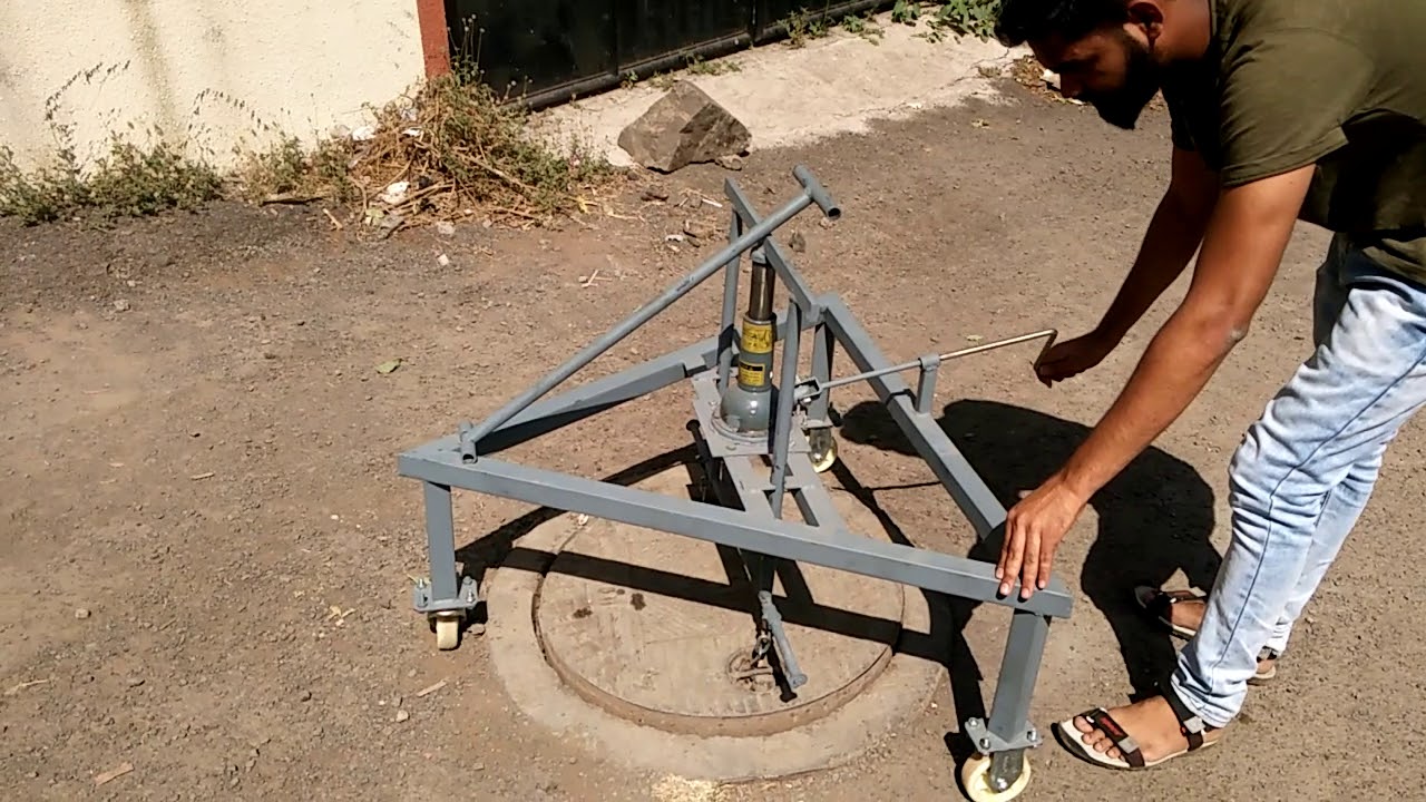 Manhole cover lifter