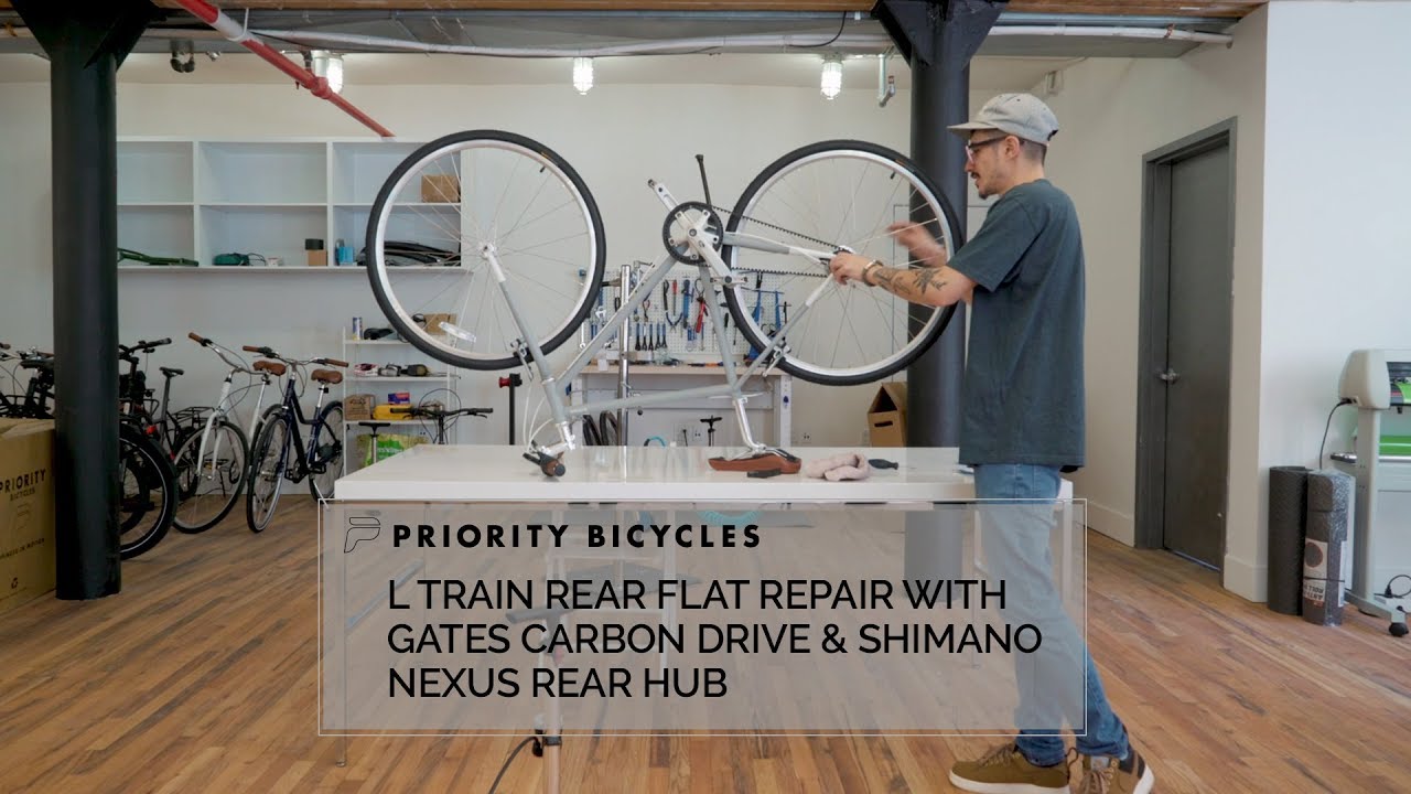 L TRAIN Rear Flat Repair with Gates Belt Drive and Shimano Nexus 7 Speed Rear Hub