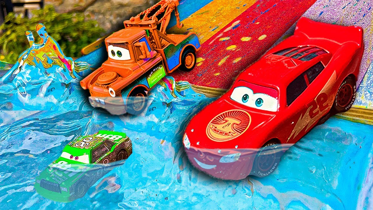 Disney Pixar Cars fall into the water: Lightning McQueen, Chick Hicks, Mack Trucks, Dinoco, Mater