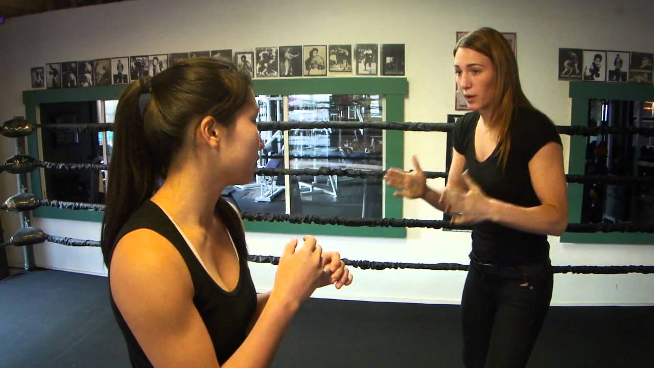 Valley Girl Boxer explains Olympic boxing strategy at Classic kickboxing gym in Pasadena Ca.
