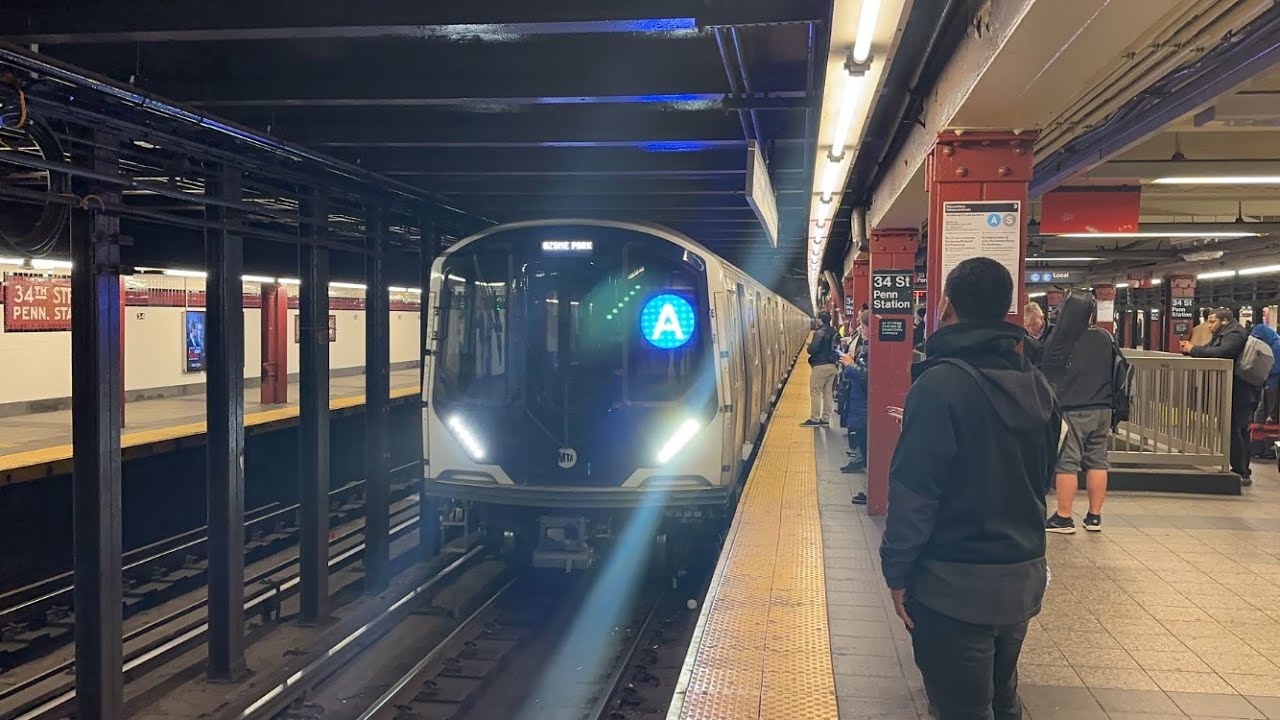 PM Rush Hour R46/R160/R179/R211A Downtown A Express And C,E Local Trains At 34th Street Penn Station