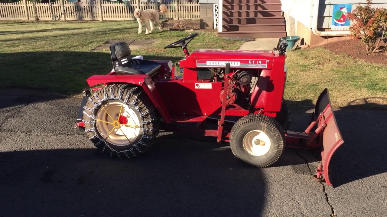 Restored 1970 Wheel Horse GT14 ready for winter.