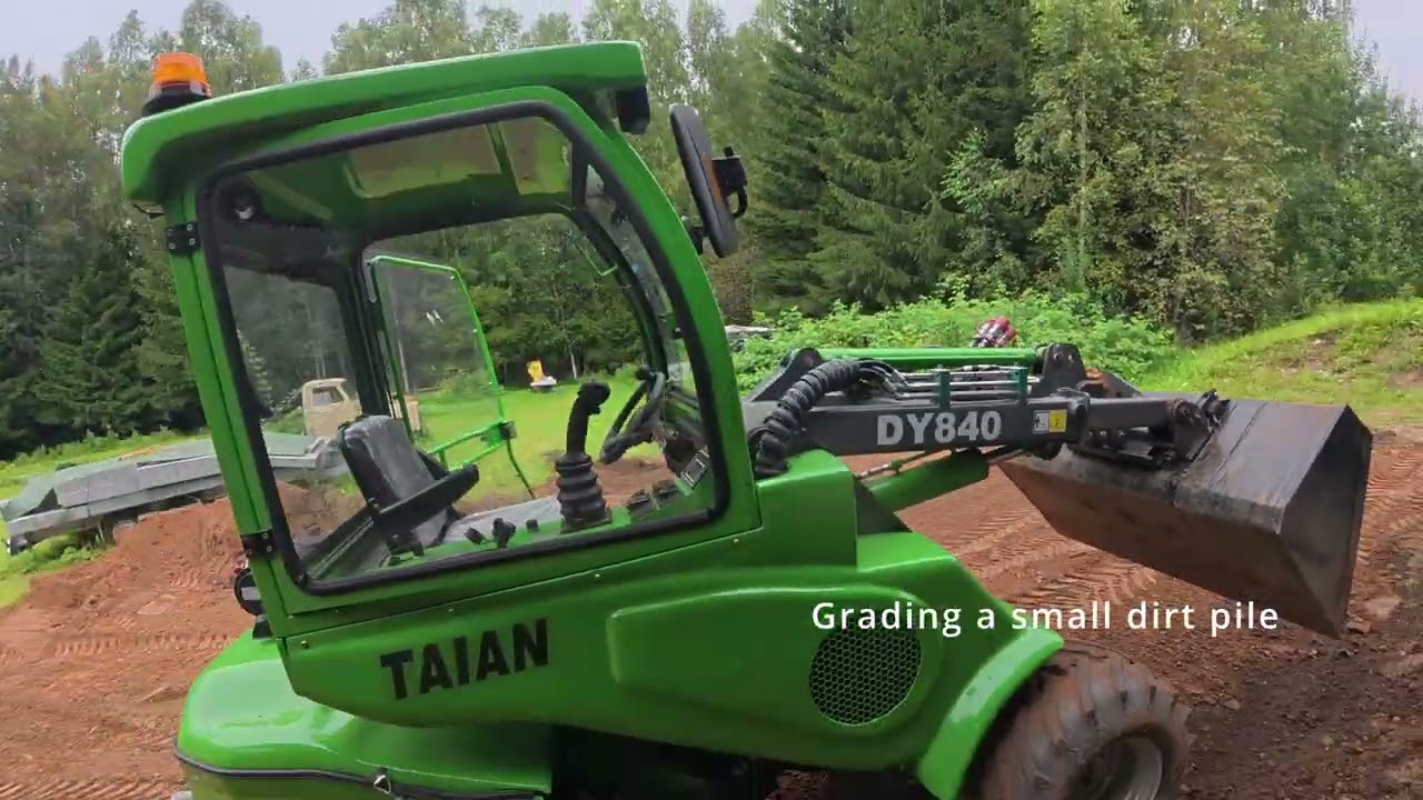 Wheel loader DY840 maintenance and a dirt pile grading.