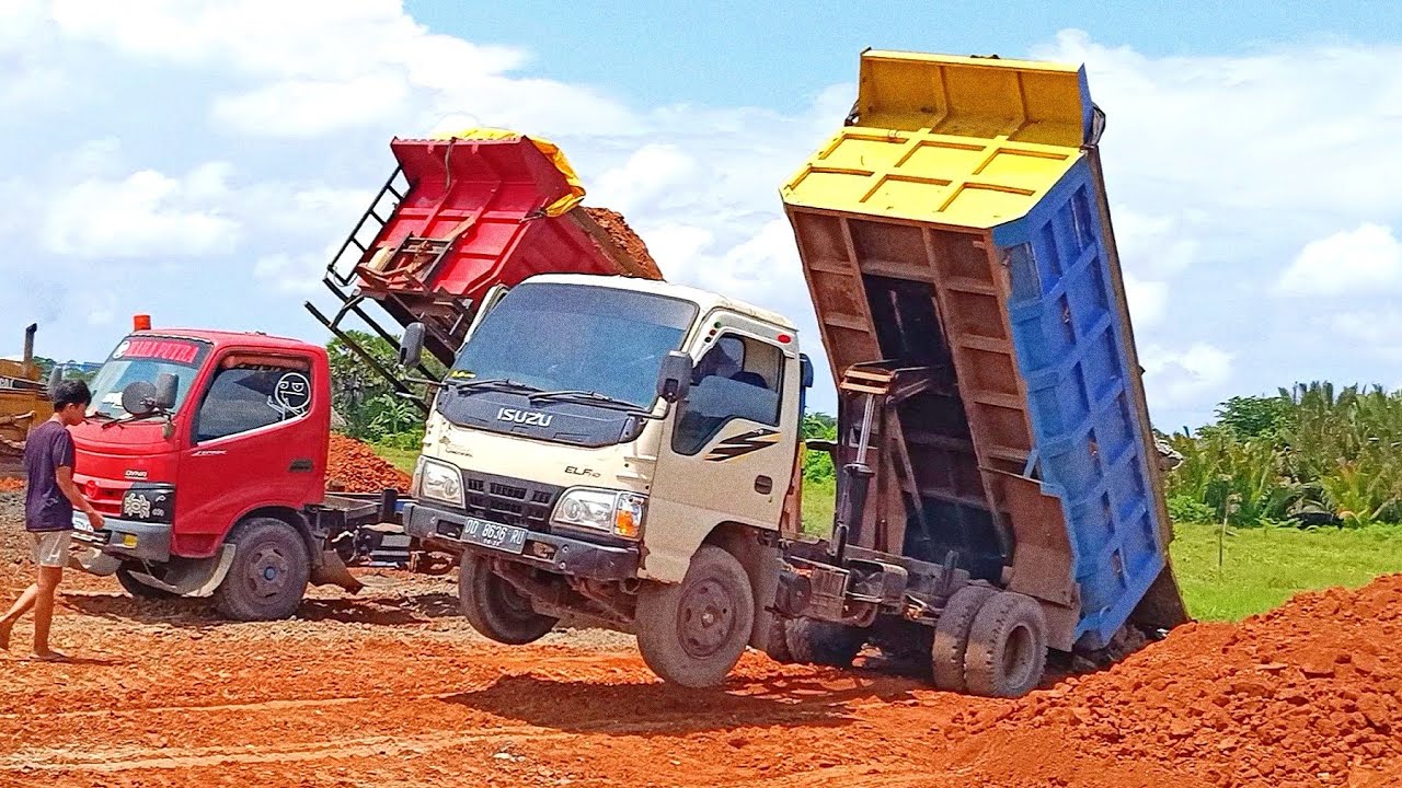 Dump Truk Tanah Isuzu Macan Jomplang Muatan Full Bak Tanah Batu Hitam 