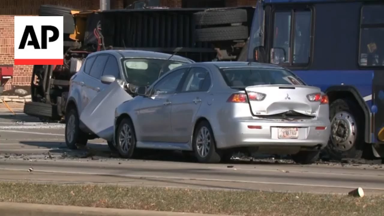 Vehicle crashes into school bus in police pursuit  in Milwaukee