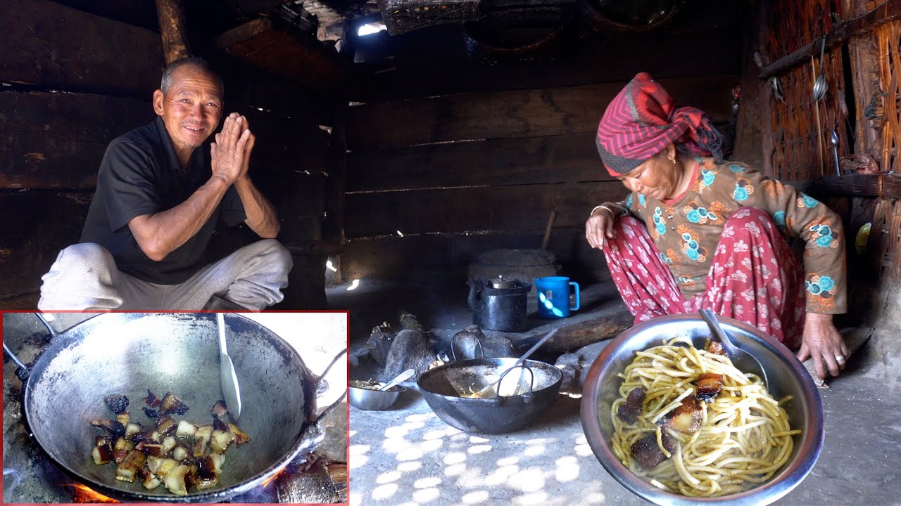 jungle man having pork noodles cooked by his wife || family in the village || life in rural Nepal ||