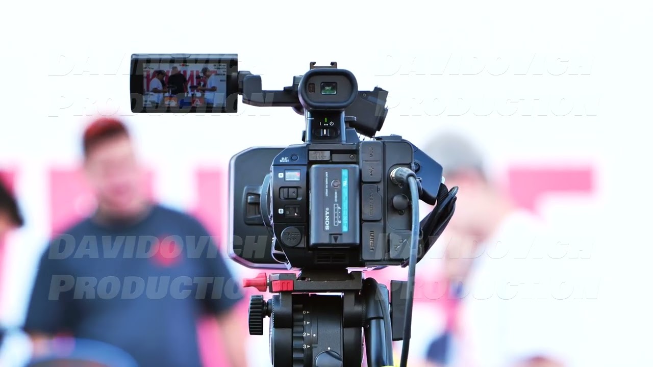 Moscow, Russia - July 5, 2025: Professional video camera recording a live event with blurred