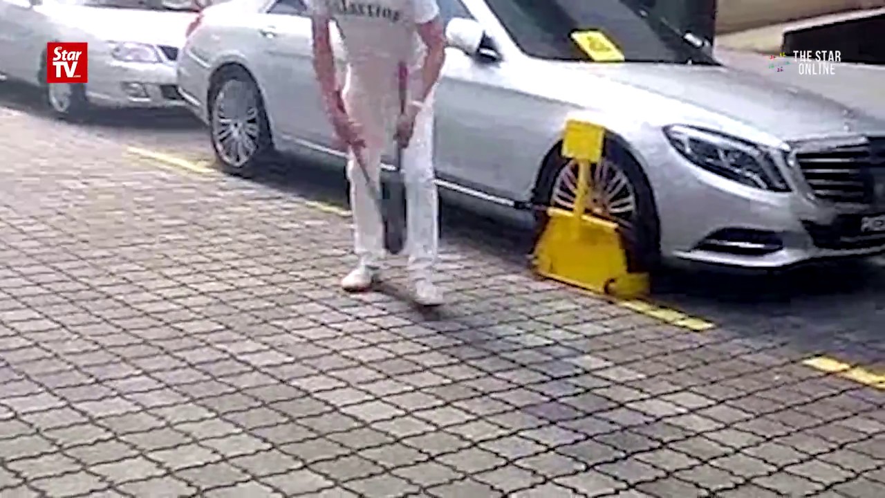 Security guard injured in parking drama