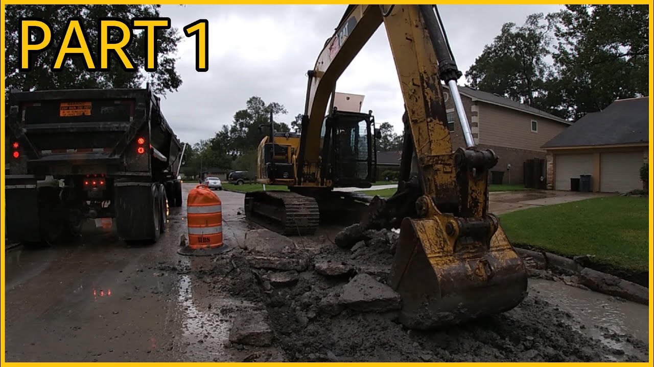 CAT 316E L excavator removing concrete and loading trucks PART 1