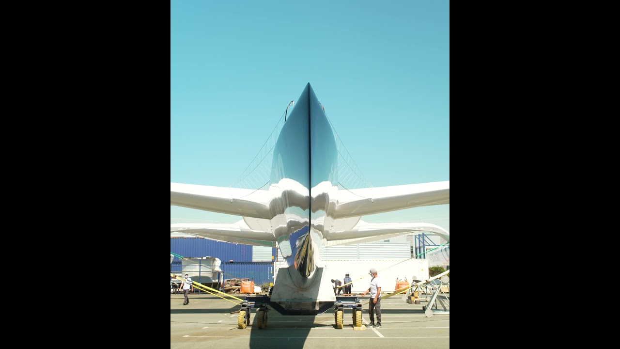 The maxi-trimaran Sails of Change out of the shed