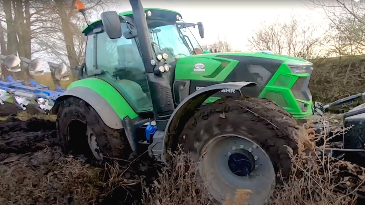 Deutz-Fahr 6185 TTV w błocie po osie