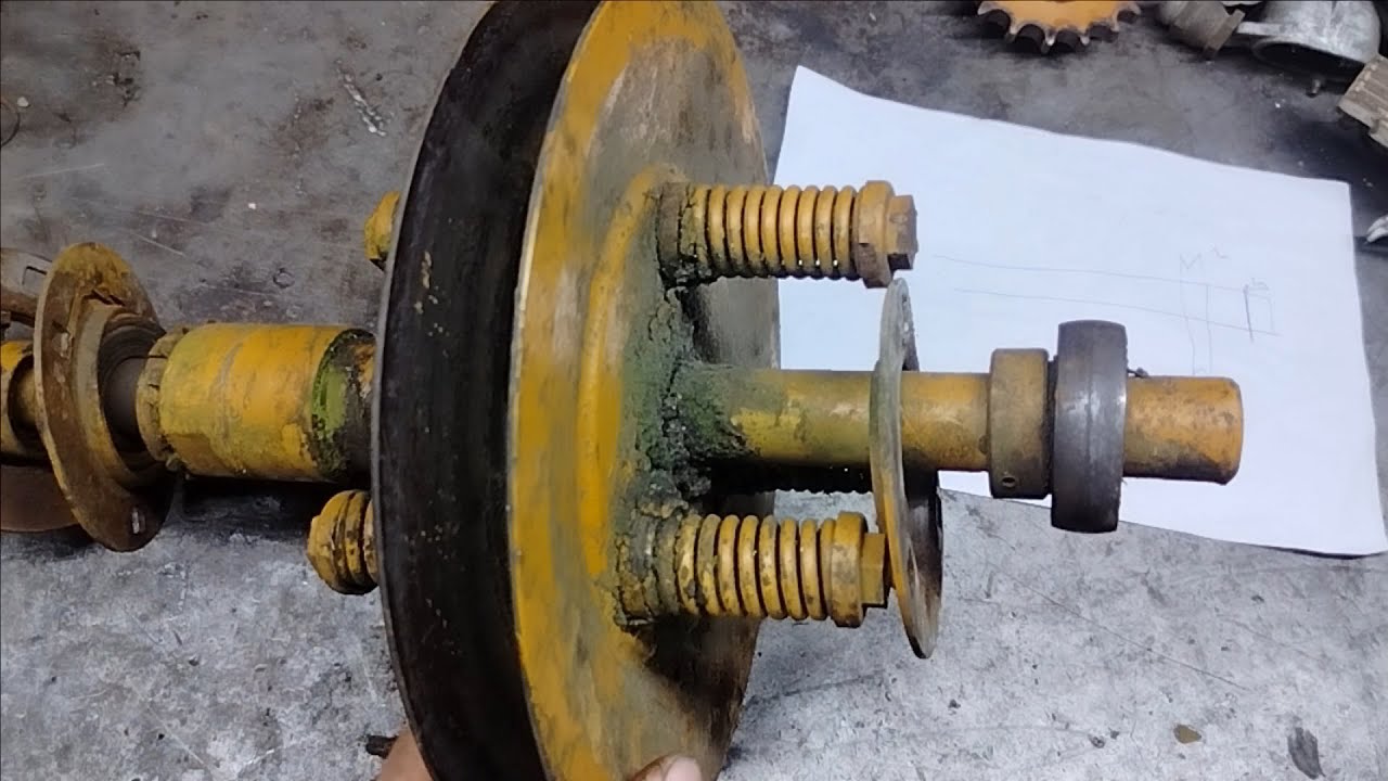 Naprawa obrotów nagarniacza Bizona Zespół pasowy górny