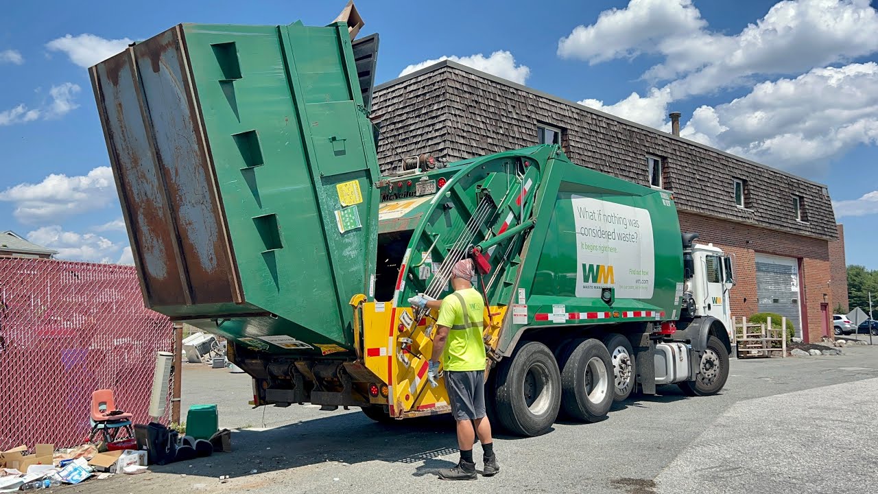 WM Garbage Truck Dumping Giant Recycle Dumpsters