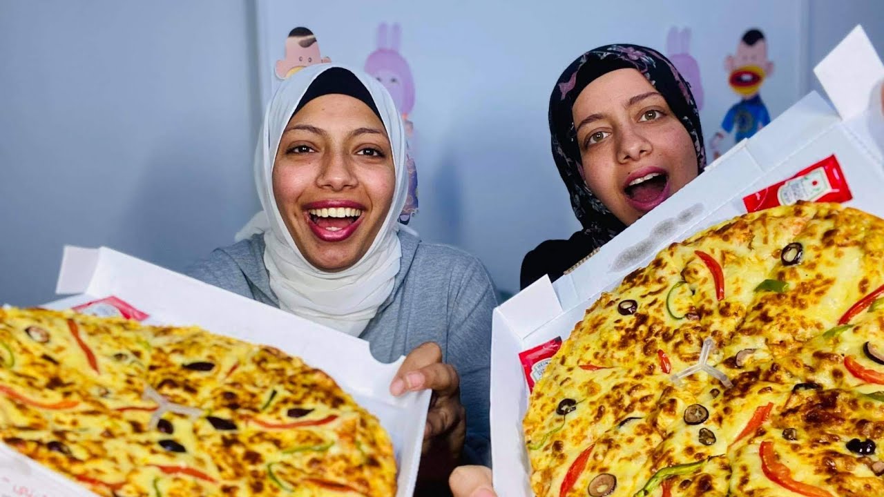 تحدي ٢ بيتزا كبيره والخسران يتعاقب