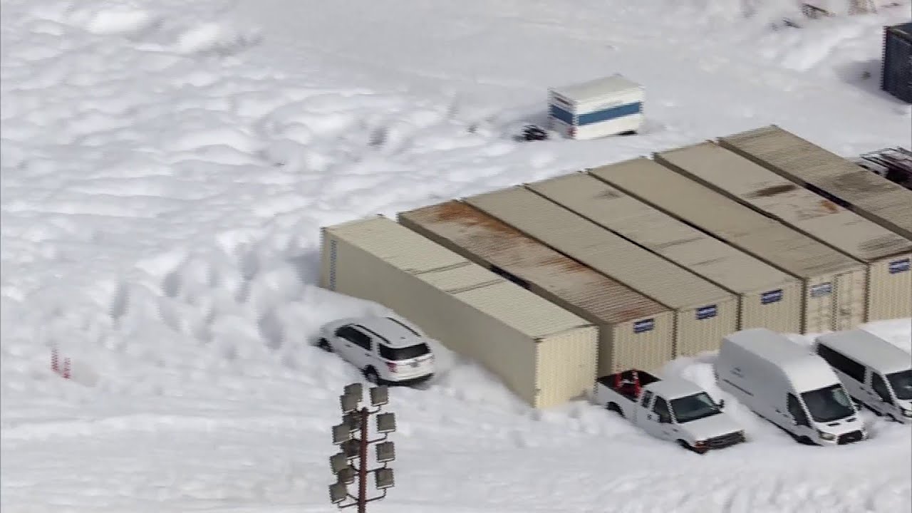 Cleanup continues of fire-suppression foam at hangar at Bush Intercontinental Airport in Houston
