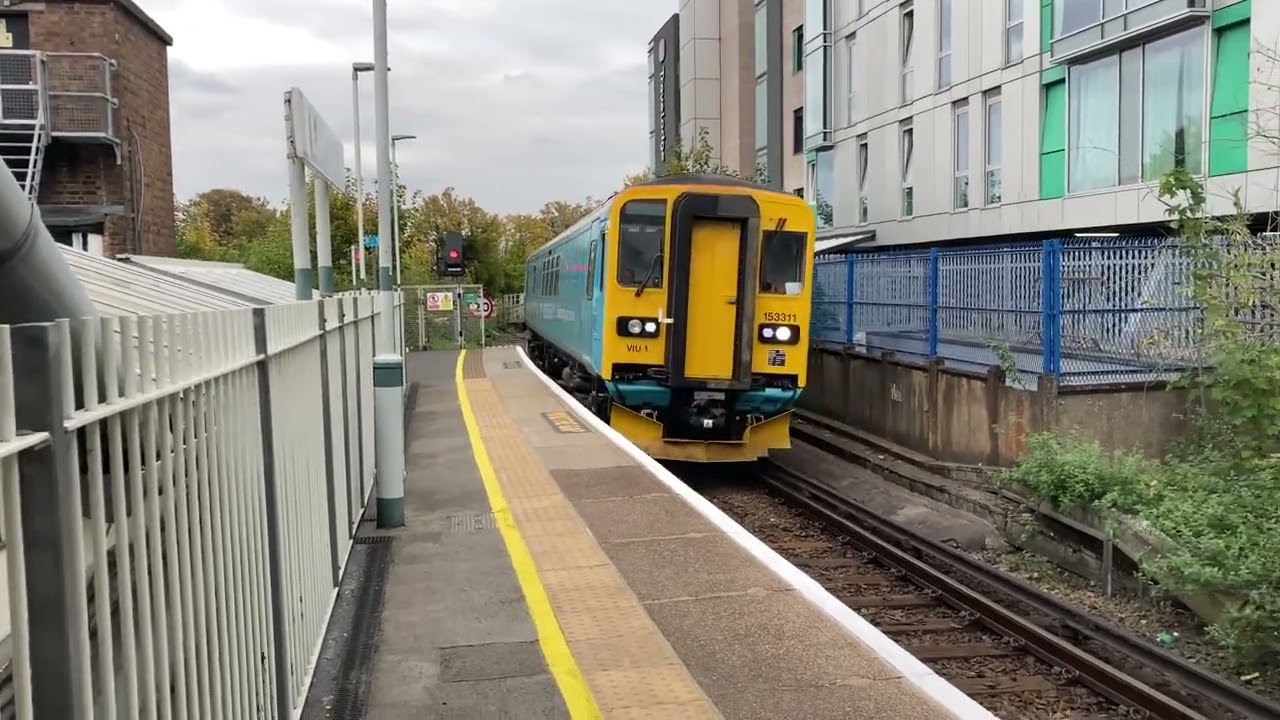 2 trains passing Epsom
