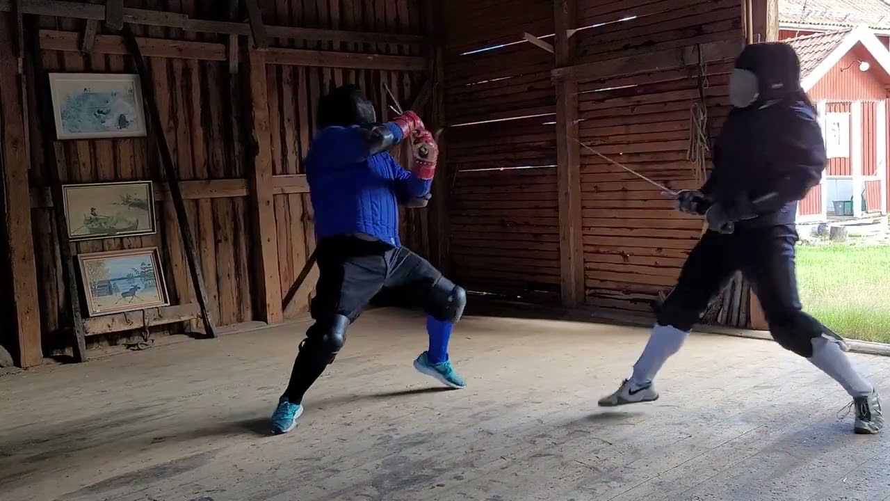 Axel and Mark Wilkie fencing with the longsword