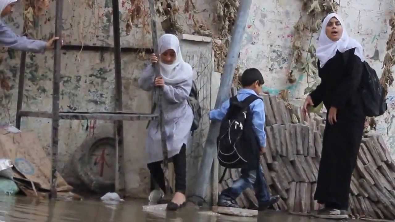 Children Navigate Sewage in the Streets of Al Sabra, Eastern Gaza City