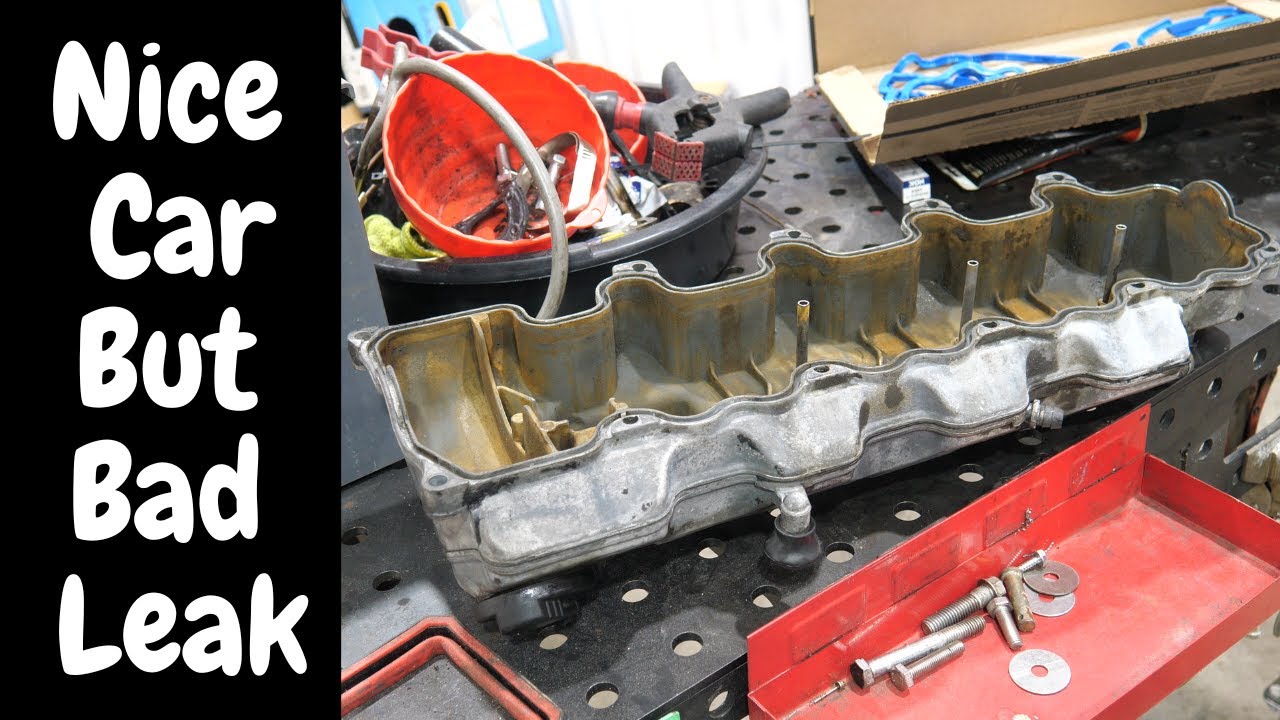 Замена крышек клапанов и свечей зажигания на Mercedes E500 Wagon, часть 1.