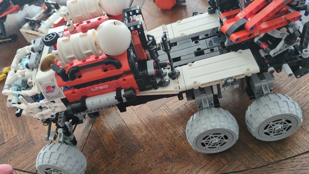 Comparison review for the three Lego Technic space sets with orange airlocks