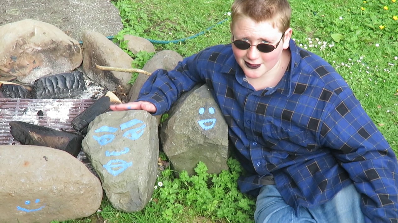 Coyote - painting faces on rocks